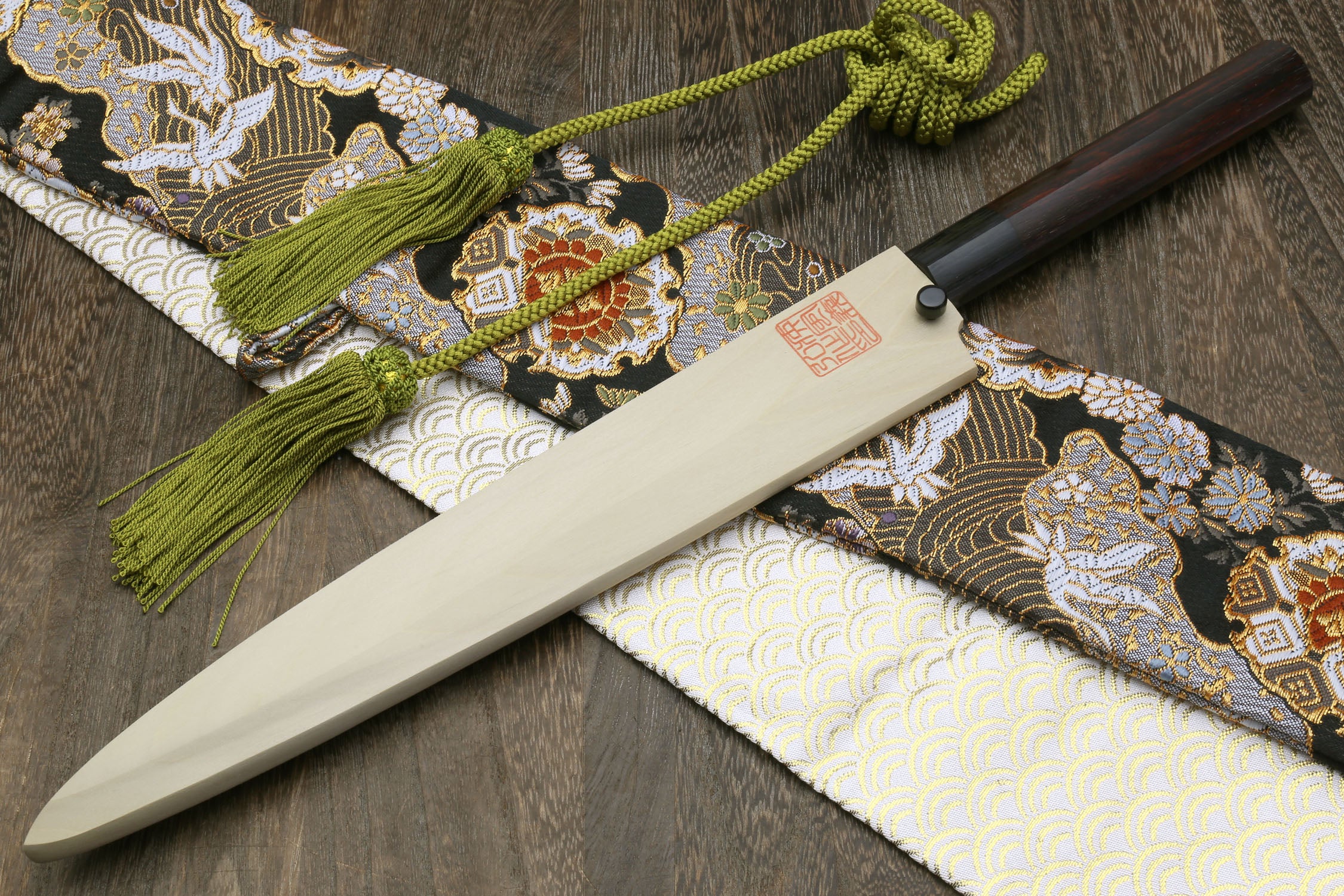Yanagi sushi sashimi knife with white blade and dark Shitan handle, full view