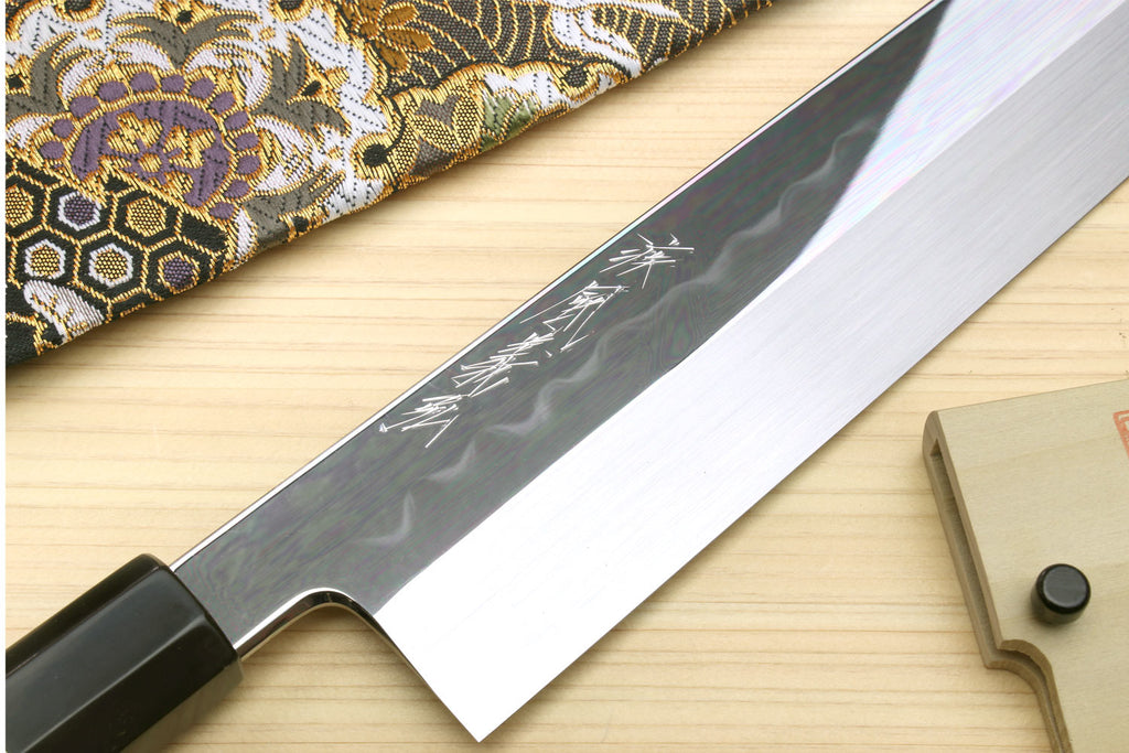 Japanese vegetable knife blade with etched pattern, dark handle with silver ring
