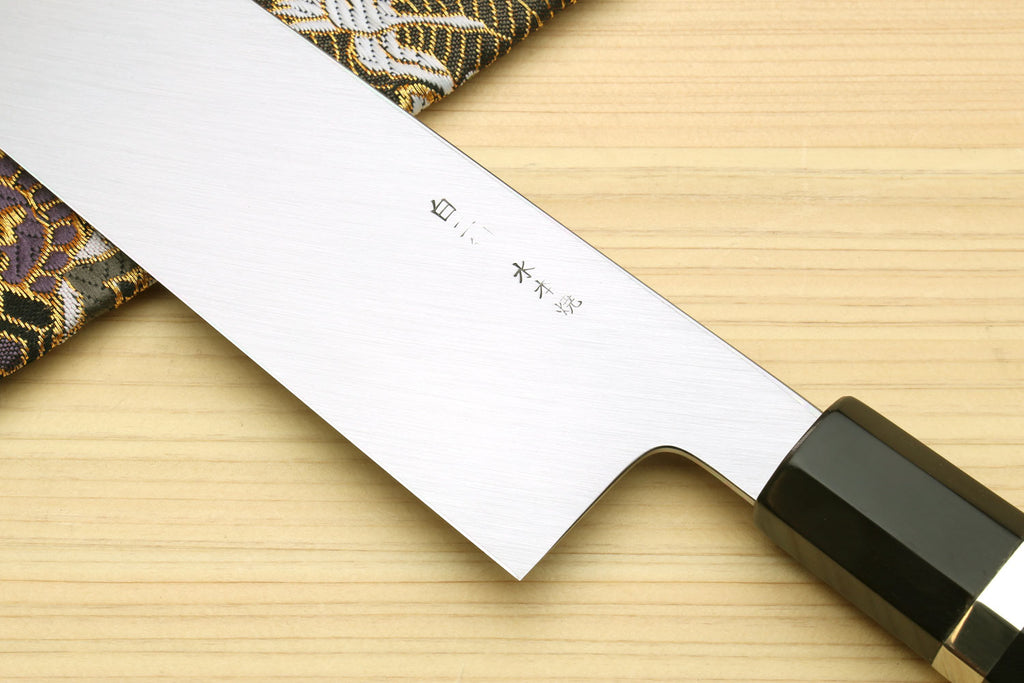 Japanese vegetable knife blade tip and edge with etched marks, dark handle sleeve