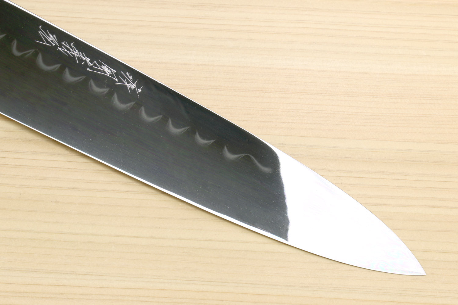 Japanese chef knife, narrow tip mirror-polished blade with wavy hamon