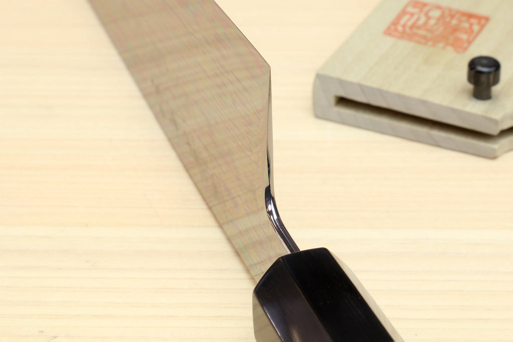 Japanese chef knife, ebony handle end with silver pin and mirror blade