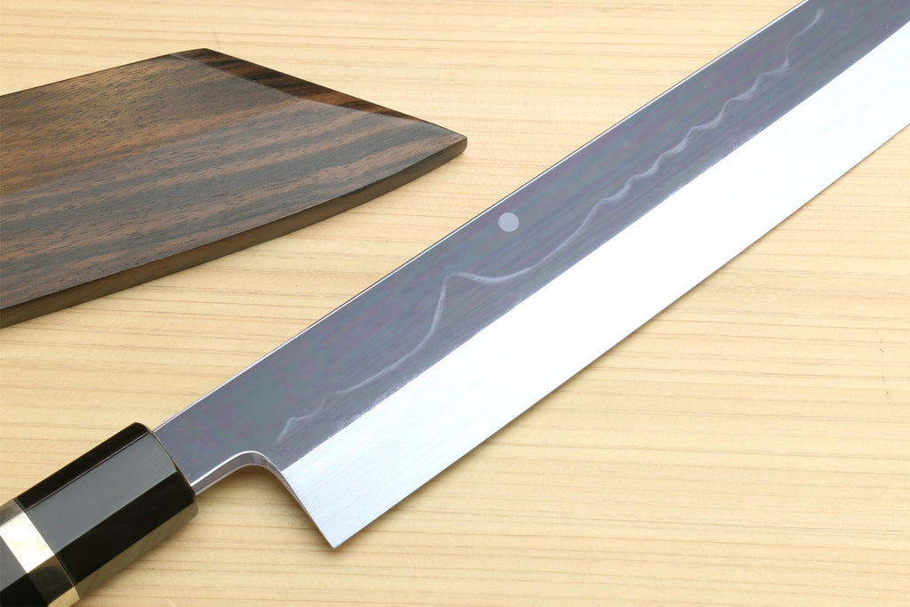 Kiritsuke chef knife with mirror-polished white steel blade and black ebony ring handle