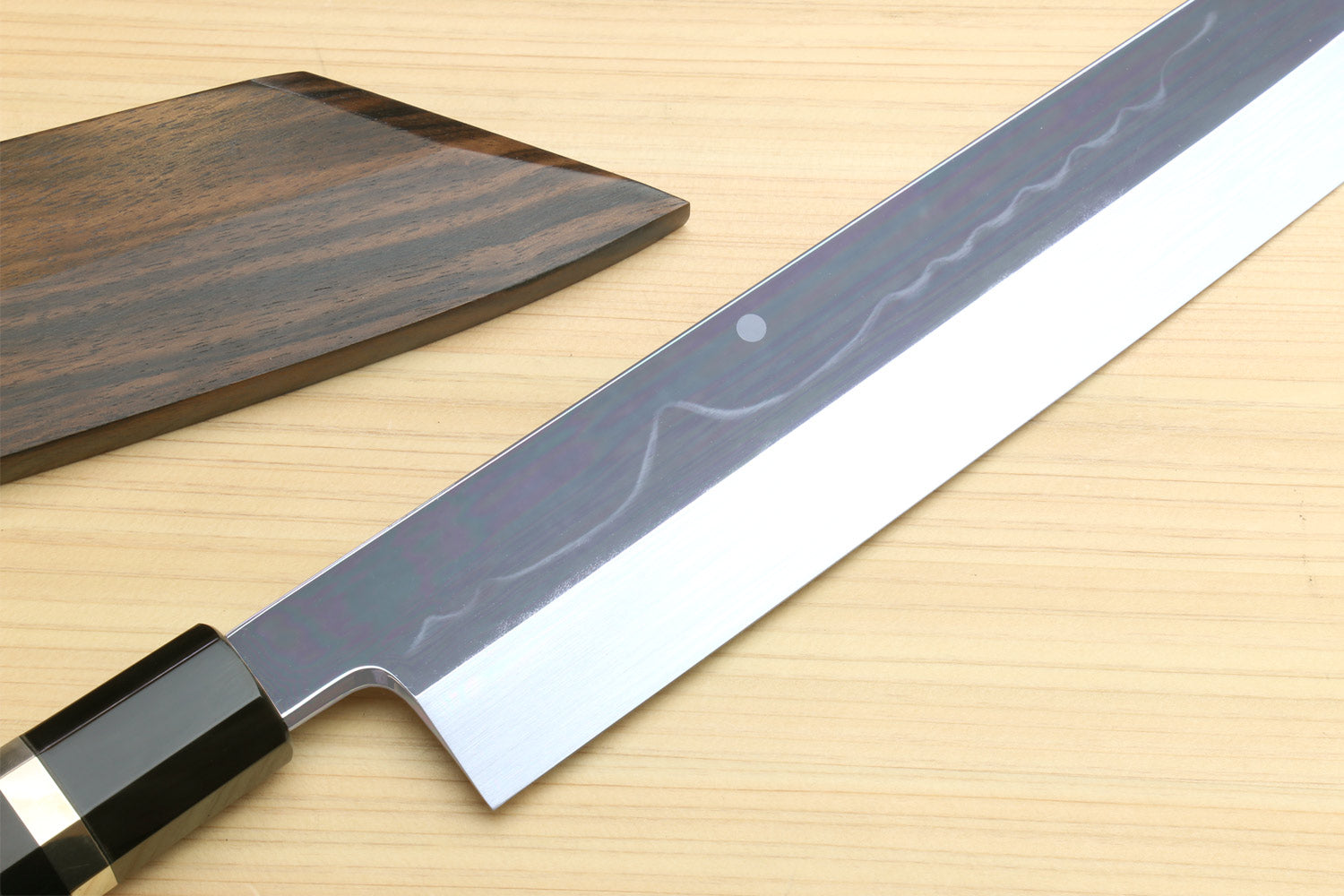 Kiritsuke chef knife with mirror-polished white steel blade and black ebony ring handle
