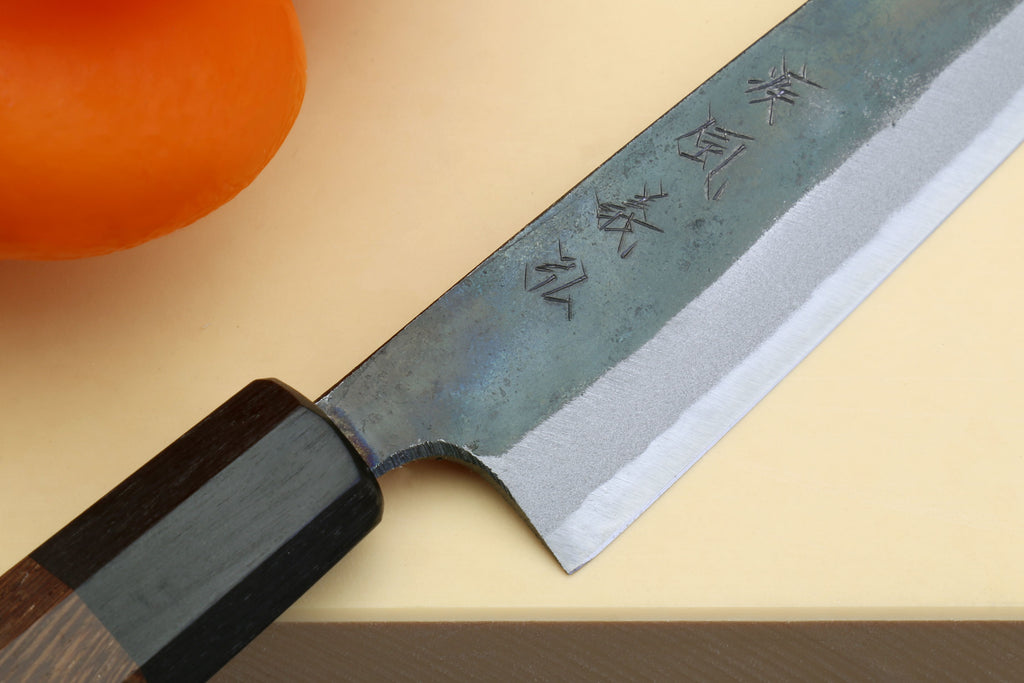 Kurouchi petty knife, blue-gray blade with stamped characters, dark shitan handle