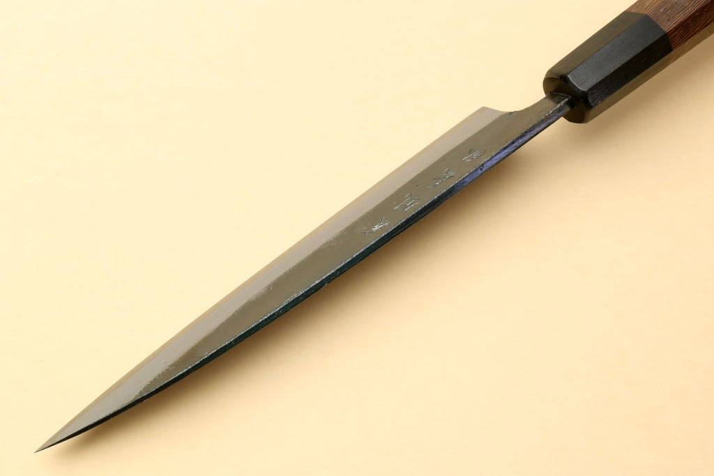 Kurouchi petty knife with long pointed blade and dark shitan handle