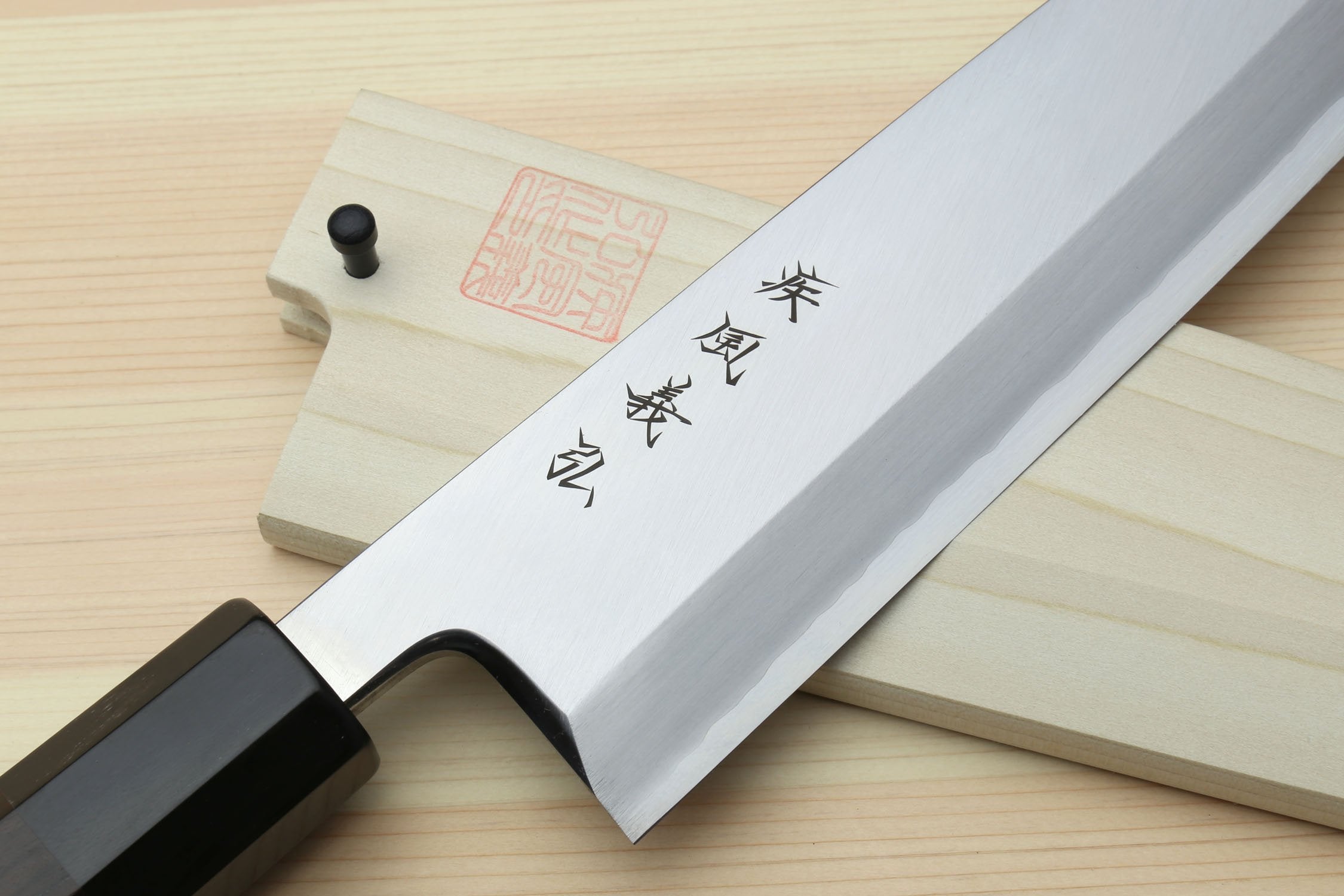 Japanese fish filet knife with ebony handle, silver blade with engraved markings