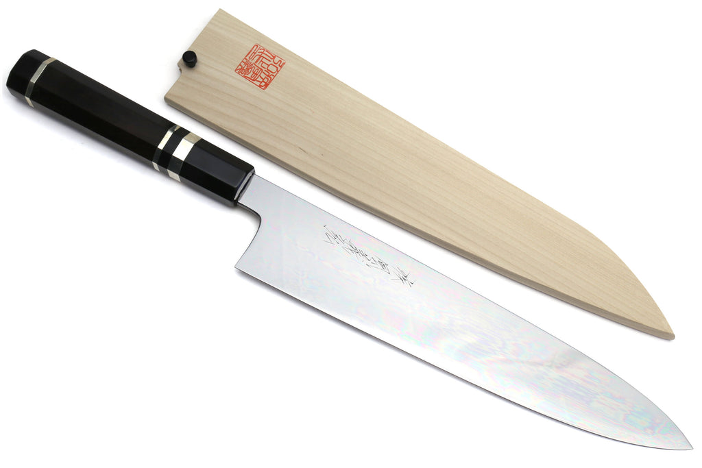 Gyuto chef knife with mirror-polished steel blade and ebony handle with striped spacer