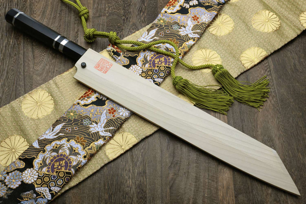 Yanagi kiritsuke knife with mirror-finished blade and ebony handle with silver accents