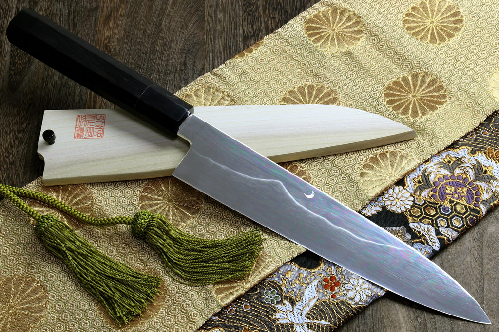 Ebony-handled gyuto chefs knife with mirror-finished steel blade, Mt. Fuji and crescent moon