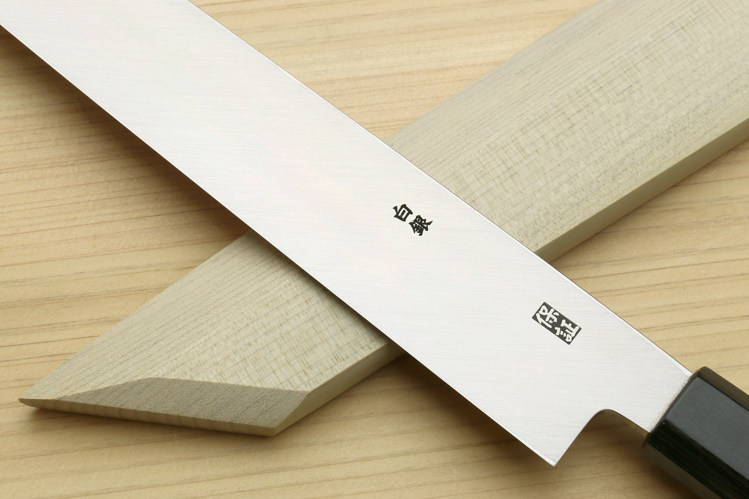 Yanagi-kiritsuke knife with engraved silver blade and dark rosewood handle