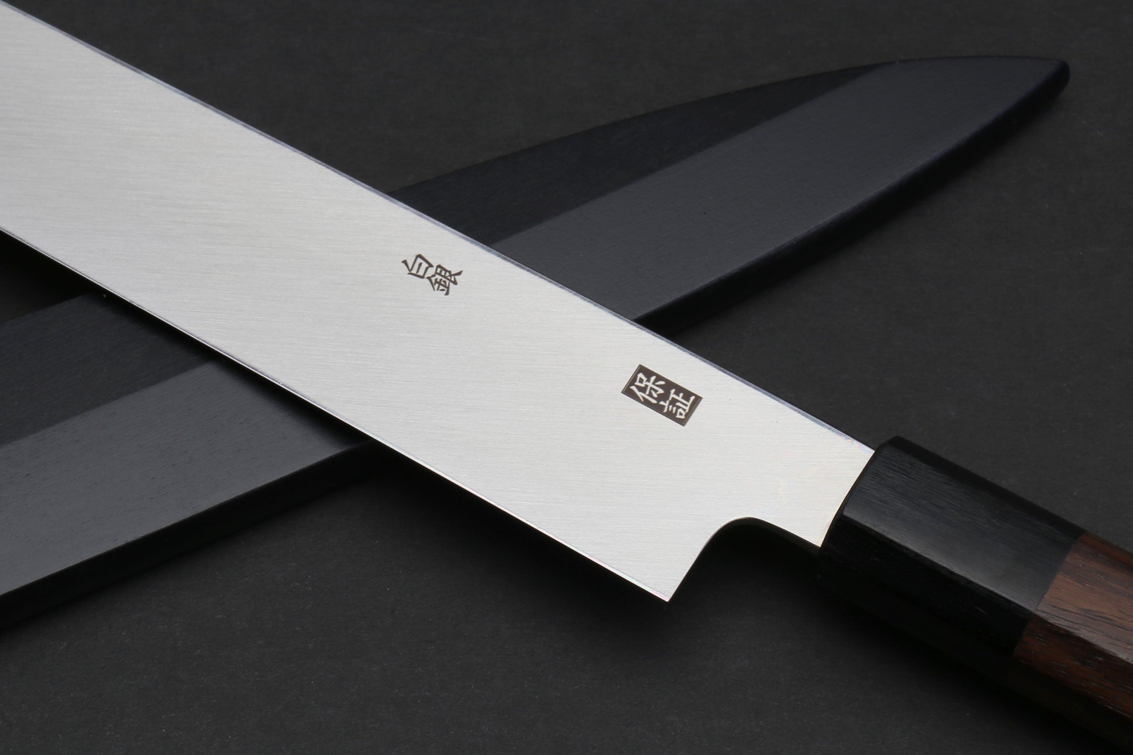 Sashimi yanagi knife with etched stainless blade and rosewood handle