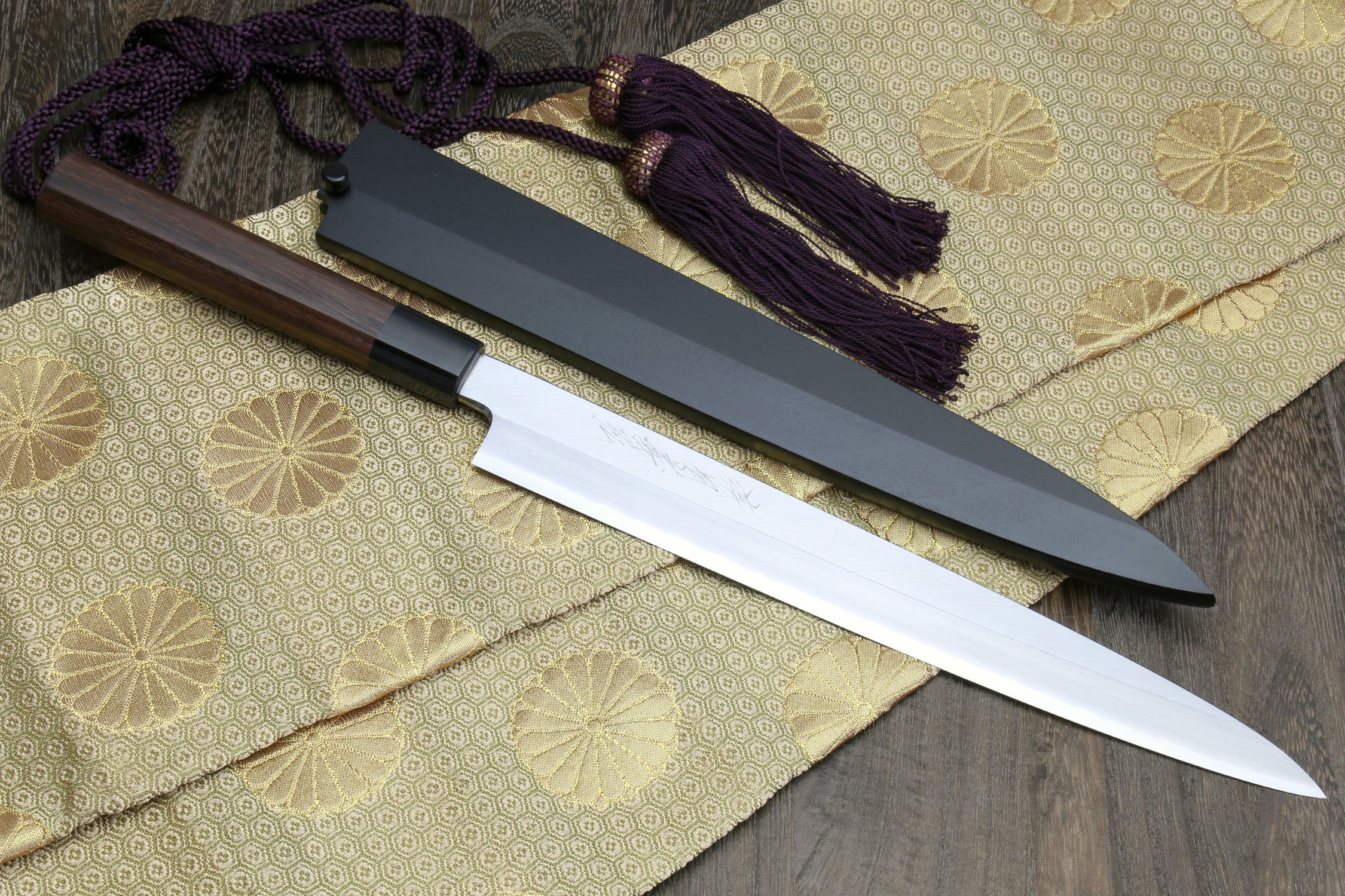 Yanagi sashimi knife with stainless blade, rosewood handle, and purple tassels