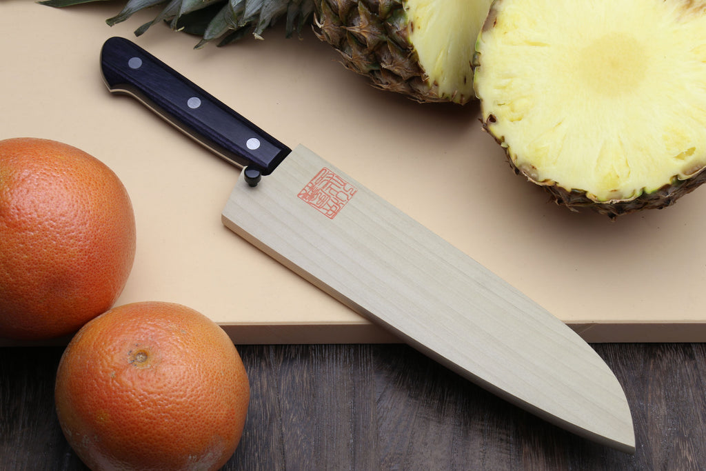 Santoku knife with dark blue handle and silver patterned blade