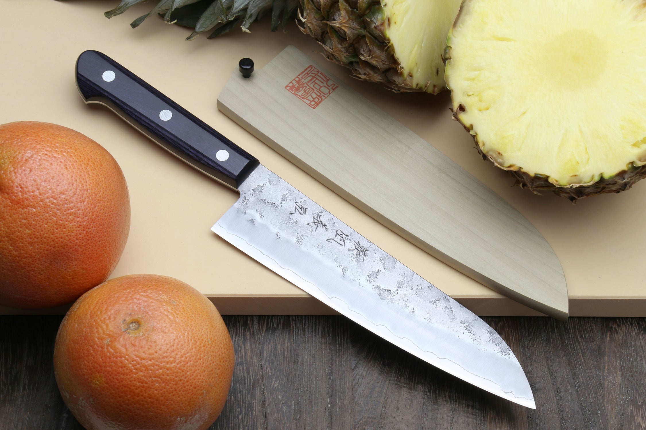 Santoku knife, dark blue handle and silver patterned blade, 7-inch