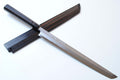 Japanese sushi knife with Damascus blade and dark ebony wood handle, full length view