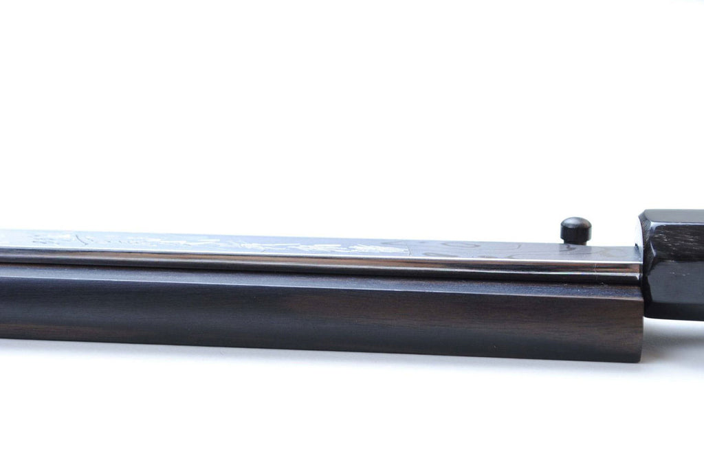 Suminagashi Japanese chef knife with dark ebony wood handle, steel tang close-up