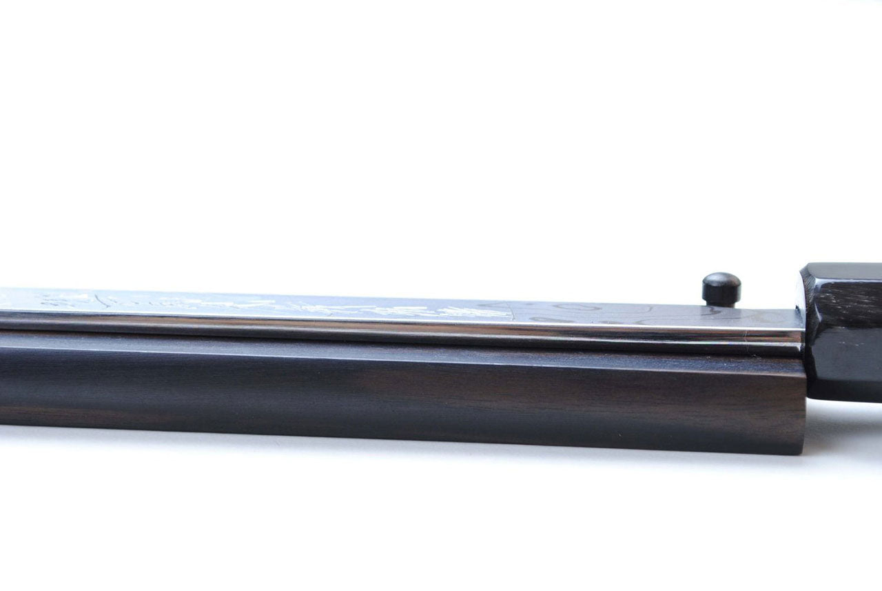 Suminagashi Japanese chef knife with dark ebony wood handle, steel tang close-up