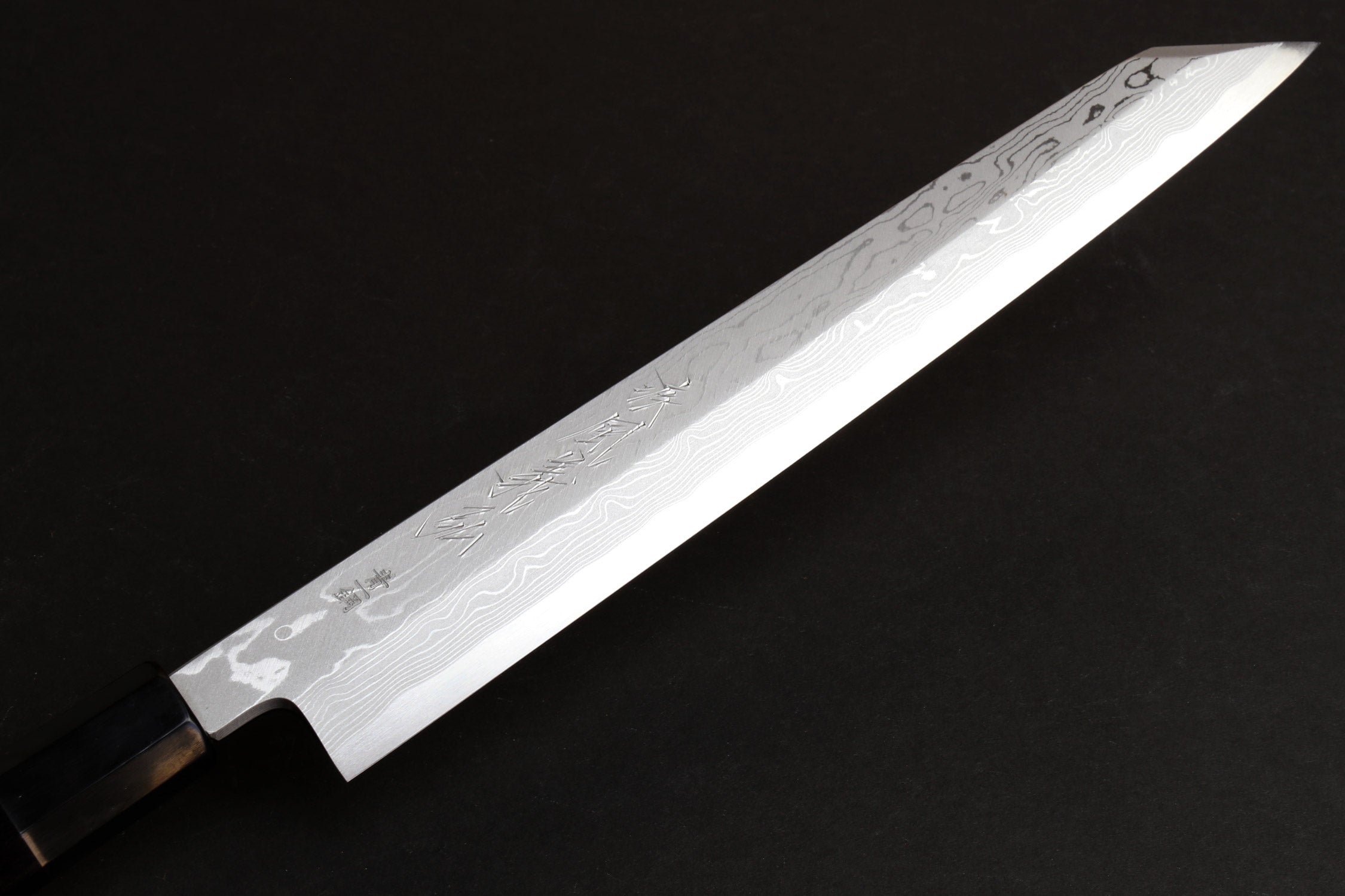 Japanese yanagi sushi knife, damascus-pattern blade with ebony handle
