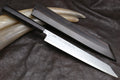 Japanese yanagi sushi knife on dark leather, damascus blade with ebony handle