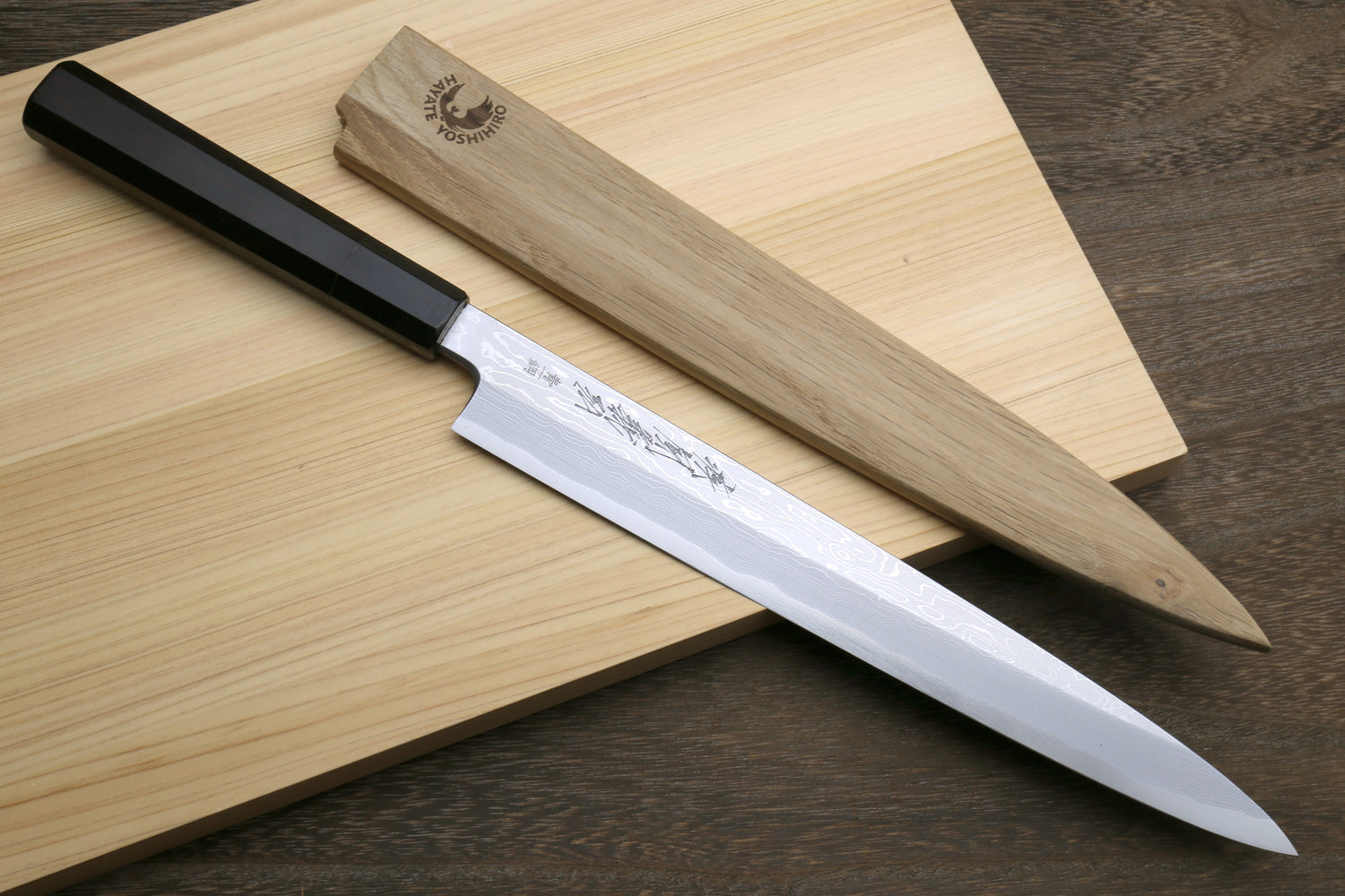 Yanagi sushi knife with ebony handle and patterned steel blade