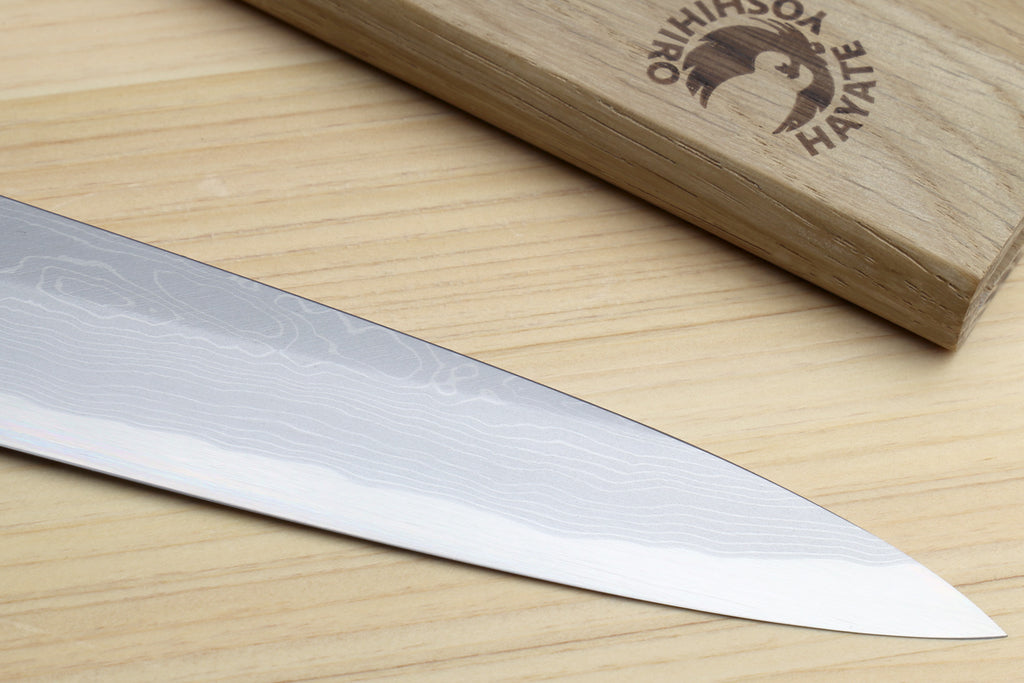 Yanagi sashimi knife with wavy steel blade and pointed tip