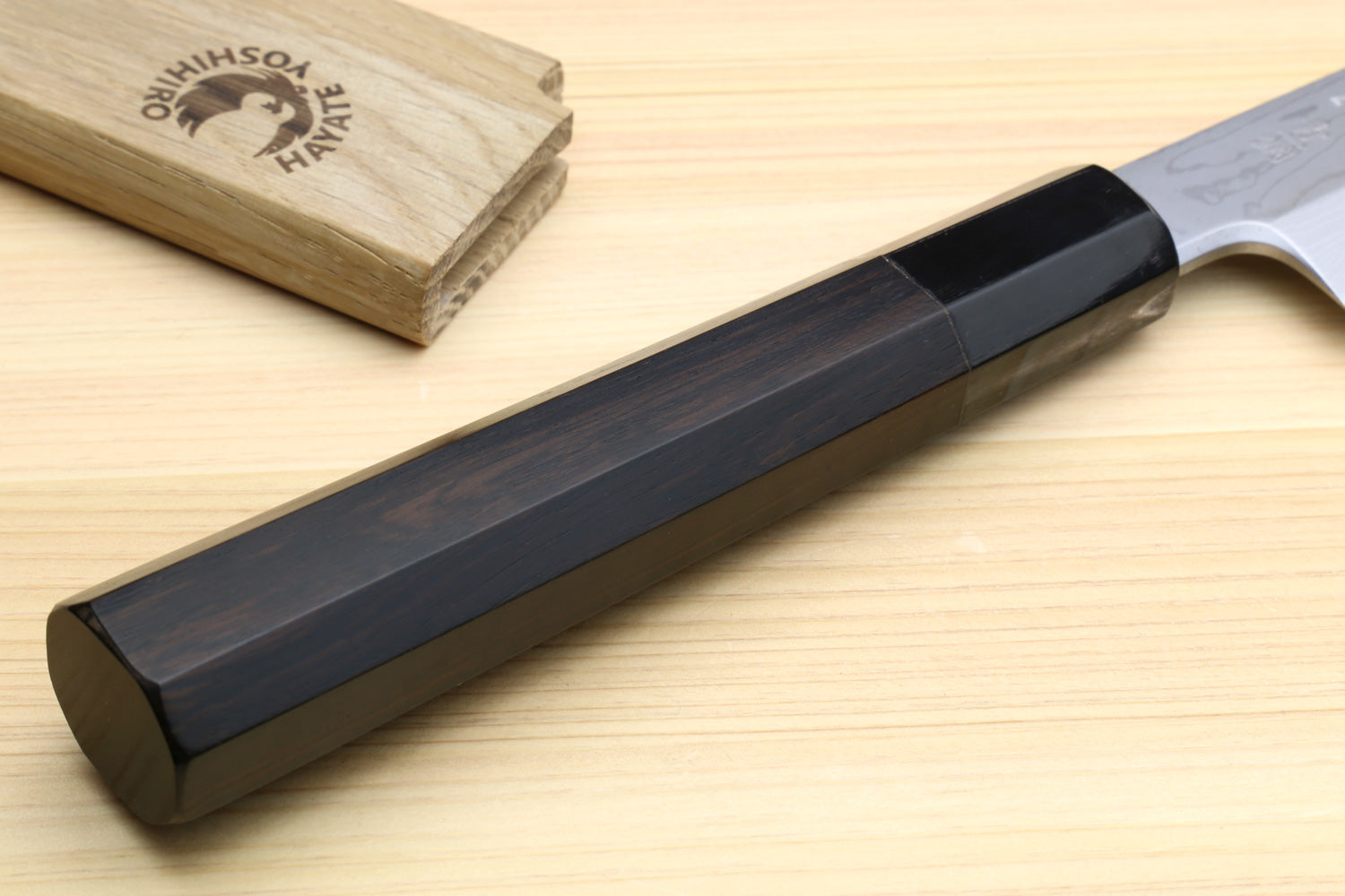 Ebony handle with black spine and wavy steel yanagi blade