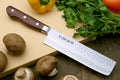Nakiri vegetable knife with hammered Damascus-style stainless blade and dark wood handle