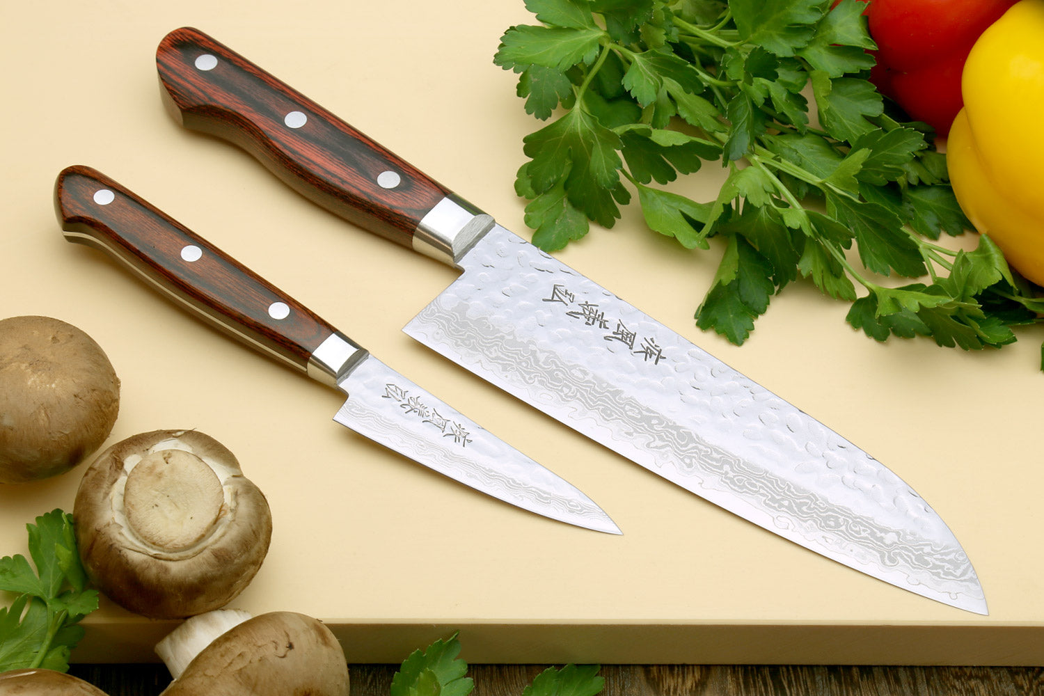 Yoshihiro VG-10 knife set with santoku and paring blades, dark wood handles