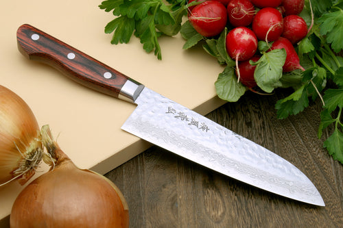Santoku chef knife with Damascus-style patterned blade and dark wood handle