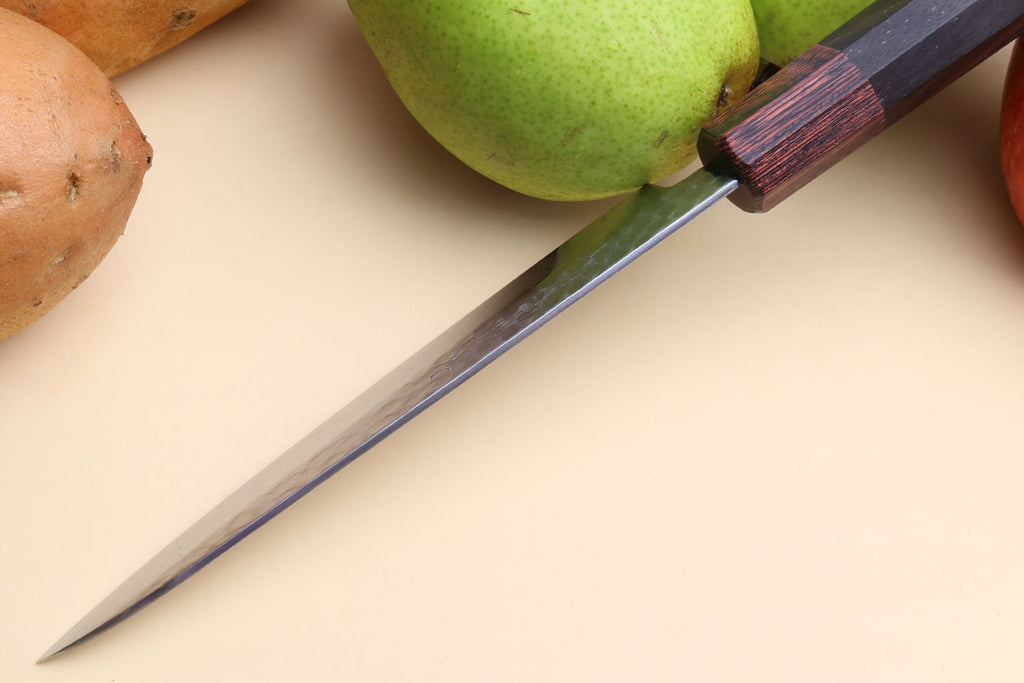 Petty utility knife with hammered Damascus blade and dark rosewood handle