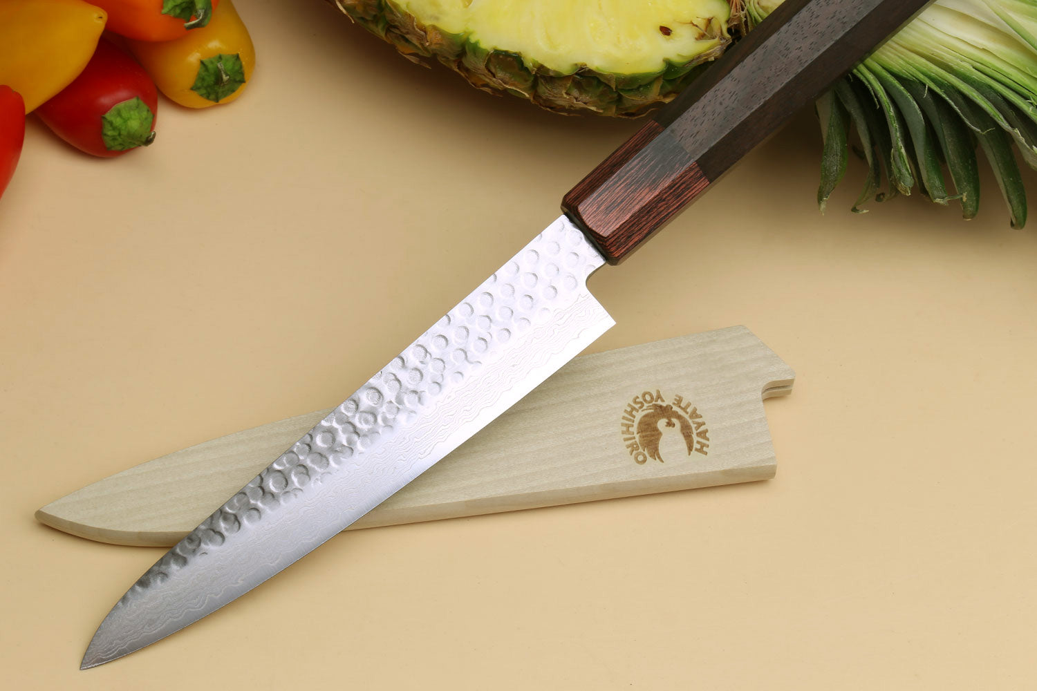 Hammered Damascus petty utility knife with rosewood handle; close-up silver blade