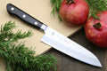 7-inch santoku chef knife with dark handle and silver stainless blade